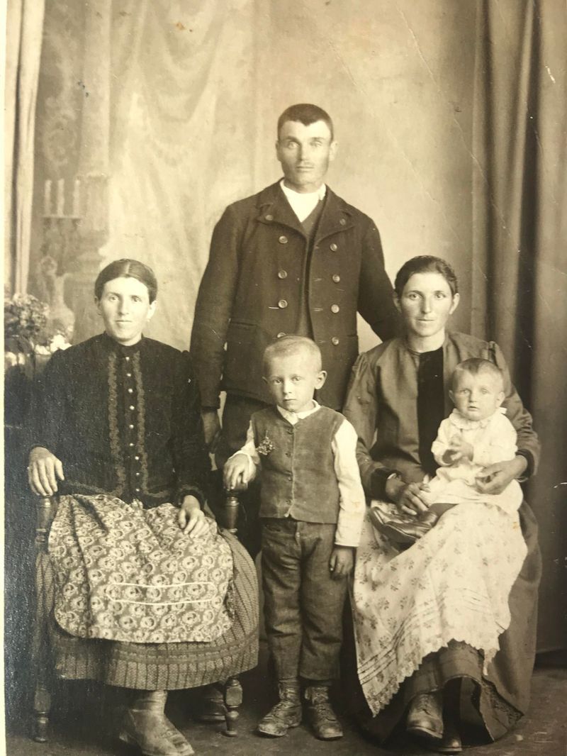 Marty Smith, whose birth name was Martin Schmidt, is shown here as a baby (on the right) on his mother's lap in 1928 in Transylvania, with his family. His mother died when he was 4 years old. (Marty Smith)